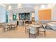 Community room with kitchen and seating at 2912 W Santiago St # 2204, Tampa, FL 33629
