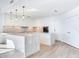 Modern kitchen with marble island and gold accents at 2912 W Santiago St # 2204, Tampa, FL 33629