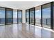 Bright living room with floor-to-ceiling windows offering stunning water views at 2912 W Santiago St # 2204, Tampa, FL 33629
