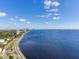 Aerial view showcasing waterfront, road, and cityscape at 2912 W Santiago St # 2204, Tampa, FL 33629