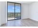 Bedroom with sliding glass doors and stunning city views at 2912 W Santiago St # 2204, Tampa, FL 33629