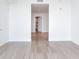 Bright hallway with light walls and wood-look tile flooring at 2912 W Santiago St # 2204, Tampa, FL 33629