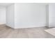 Bright and airy bedroom with neutral walls and wood-look tile flooring at 2912 W Santiago St # 2204, Tampa, FL 33629