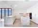 Modern kitchen with marble island and water views at 2912 W Santiago St # 2204, Tampa, FL 33629