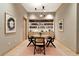 Community library with a round table, chairs, and built-in shelves at 2912 W Santiago St # 2204, Tampa, FL 33629