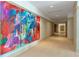 Building hallway with colorful modern art at 2912 W Santiago St # 2204, Tampa, FL 33629