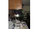 Kitchen features a fish tank and cabinetry at 321 77Th Ave, St Pete Beach, FL 33706
