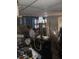Storage or utility room with various items and a tall lamp at 321 77Th Ave, St Pete Beach, FL 33706