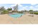 Community pool with plenty of lounge chairs at 4850 51St W St # 3105, Bradenton, FL 34210