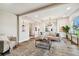 Light-filled living room showcasing comfortable seating and a coffee table at 5908 S Manhattan Ave, Tampa, FL 33616