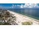 Aerial view showing beach, ocean, and high-rise buildings at 660 Island Way # 908, Clearwater Beach, FL 33767