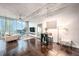 Modern living room boasts city views, dark tile floors, and comfy seating at 777 N Ashley Dr # 1808, Tampa, FL 33602