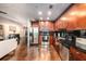Modern kitchen with dark wood cabinets and stainless steel appliances at 777 N Ashley Dr # 1808, Tampa, FL 33602