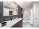 Contemporary bathroom with a white marble shower and a chevron tiled floor at 777 N Ashley Dr # 1808, Tampa, FL 33602