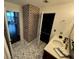 Bathroom with modern vanity and a chevron patterned floor at 777 N Ashley Dr # 1808, Tampa, FL 33602