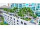 Lush rooftop terrace with palm trees and seating at 777 N Ashley Dr # 1808, Tampa, FL 33602