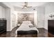Bright bedroom with ensuite bathroom access and a brick feature wall at 777 N Ashley Dr # 1808, Tampa, FL 33602