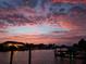 Stunning sunset over the canal and boats at 8060 Gulf Blvd, St Pete Beach, FL 33706