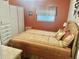 Cozy bedroom with a double bed, dresser, and closet at 9790 66Th N St # 289, Pinellas Park, FL 33782