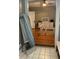 Bedroom with hardwood floors, gray walls, and white dresser at 1003 W Mahoney St, Plant City, FL 33563