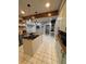 Bright kitchen showcasing a center island, butcher block counters, and stainless steel appliances at 1003 W Mahoney St, Plant City, FL 33563
