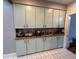 Charming kitchen featuring stylish cabinets, butcher block countertops, and subway tile backsplash at 1003 W Mahoney St, Plant City, FL 33563