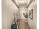 Bright and spacious entryway with tile flooring and neutral walls at 107 Slipper Key Rd, Apollo Beach, FL 33572