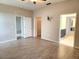 Large main bedroom with tile floors and access to bathroom and closet at 107 Slipper Key Rd, Apollo Beach, FL 33572