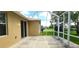 Spacious screened porch overlooking the backyard at 107 Slipper Key Rd, Apollo Beach, FL 33572