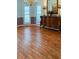 Formal dining room showcasing hardwood floors and natural light at 1135 Candler Rd, Clearwater, FL 33765