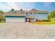 Three-car garage and brick paver driveway at 1135 Candler Rd, Clearwater, FL 33765