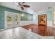 Dining room with hardwood floors and a built-in hutch at 209 Orange Dr, Lutz, FL 33548