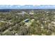 Lush, sprawling community surrounded by green trees and serene lakes, providing an escape in nature at 2501 Rustic Oaks Dr, Lutz, FL 33559
