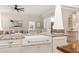 Beautiful kitchen with a farmhouse sink, granite counters, and seamlessly connects to the living area at 2501 Rustic Oaks Dr, Lutz, FL 33559