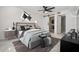 Bedroom boasts a modern design with a sliding closet door and ensuite bathroom at 3020 Bonaventure Cir # 102, Palm Harbor, FL 34684