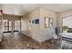 Community room with tables, chairs, and a kitchenette at 3020 Bonaventure Cir # 102, Palm Harbor, FL 34684