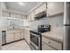 Well-maintained kitchen with stainless steel appliances at 3020 Bonaventure Cir # 102, Palm Harbor, FL 34684
