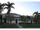 Front view of two-unit building with landscaping at 3402 W Obispo St, Tampa, FL 33629