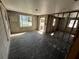 An empty living room with exposed cinderblock walls and wooden framing at 507 79Th Ave, St Pete Beach, FL 33706