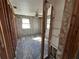 Unfinished bedroom with exposed cinderblock walls and flooring at 507 79Th Ave, St Pete Beach, FL 33706