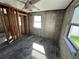 Unfinished bedroom with exposed cinderblock walls and flooring at 507 79Th Ave, St Pete Beach, FL 33706