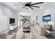 Living room with light beige furniture and ceiling fan at 6489 Hazelwood Rd, Spring Hill, FL 34608