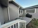 Backyard with wooden deck, grill, and partially visible fence at 1003 W Mahoney St, Plant City, FL 33563