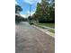 Brick-paved street with mature trees and residential homes at 1003 W Mahoney St, Plant City, FL 33563