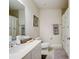 Simple bathroom with a shower/tub combo and white vanity at 18027 Turning Leaf Cir, Land O Lakes, FL 34638