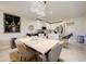 Modern kitchen with white cabinetry, stainless steel appliances, and an island at 18027 Turning Leaf Cir, Land O Lakes, FL 34638