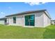 Newly built home with AC unit and grassy backyard at 29546 Fedora Cir, Brooksville, FL 34602