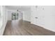 Bright and spacious living area with sliding glass doors to the backyard at 29546 Fedora Cir, Brooksville, FL 34602