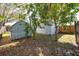 Backyard with shed and wooden fence at 306 Inlet Ct, Largo, FL 33756