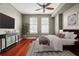 Stylish bedroom featuring hardwood floors, large windows, and elegant decor elements at 345 Bayshore Blvd # 308, Tampa, FL 33606